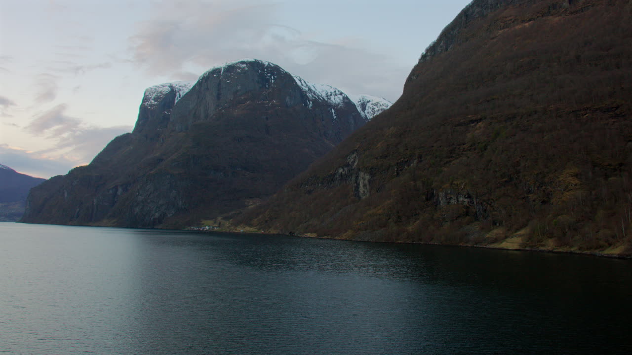 Slow tracking shot of Sogneflord by Undredal village in the Fjords.