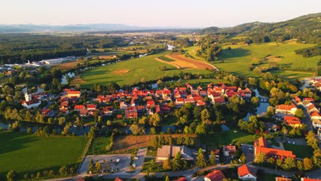 stunning aerial 4k drone footage of kostanjevica na krki in the golden sunset light