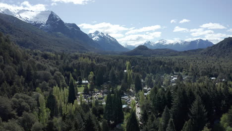 AERIAL---Colonia-Suiza-village-near-Bariloche,-Rio-Negro,-Argentina,-forward-tilt-down-reveal