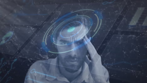 man concentrating with digital interface and data processing animation over his face