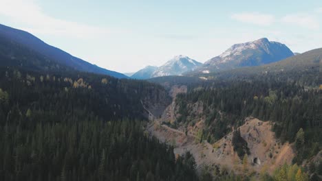 Astonishing-Aerial-Shot-of-the-Coquihalla-River-Canyon-in-British-Columbia-Canada-in-the-autumn-on-a-sunny-day