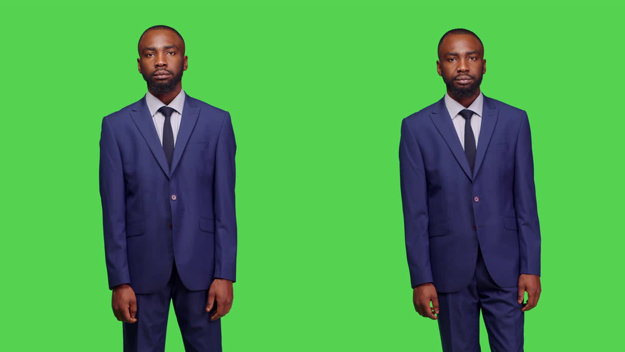 Empresário afro-americano em traje formal contra um plano de fundo verde