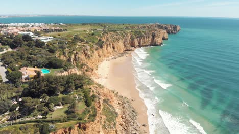 ponta da piedade emerald sea water, sand beaches and scarps, lagos, portugal