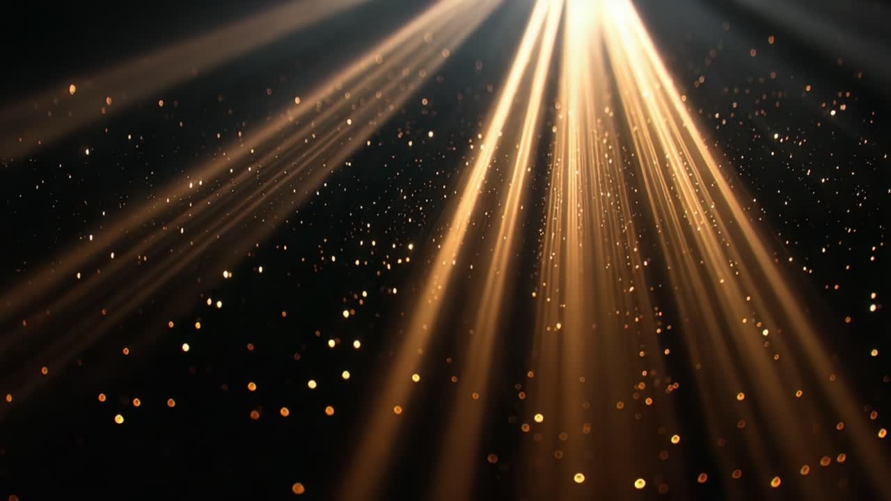 Radiant beams of golden light illuminate a shimmering backdrop, creating a mesmerizing spectacle of sparkling particles that dance in the darkness