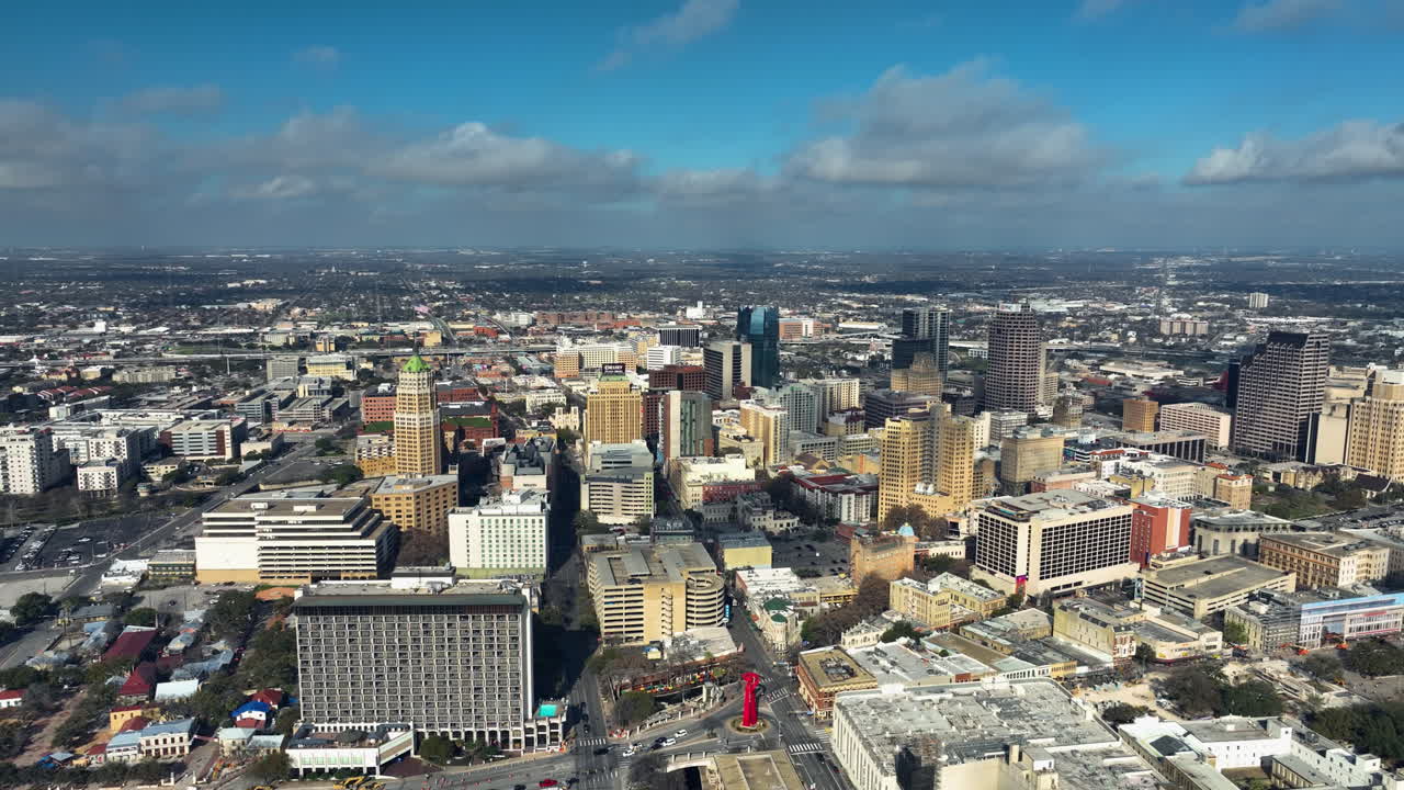 Panoramic drone shot circling the San Antonio skyline, sunny day in Texas, USA