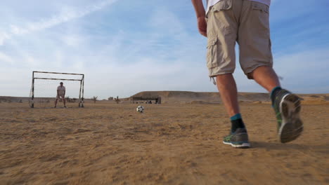 goal attempt in beach football