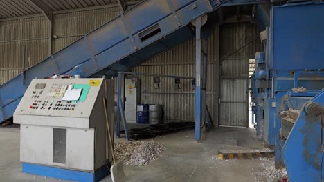 Conveyor-belt,-other-machinery-and-control-console-at-recycling-plant