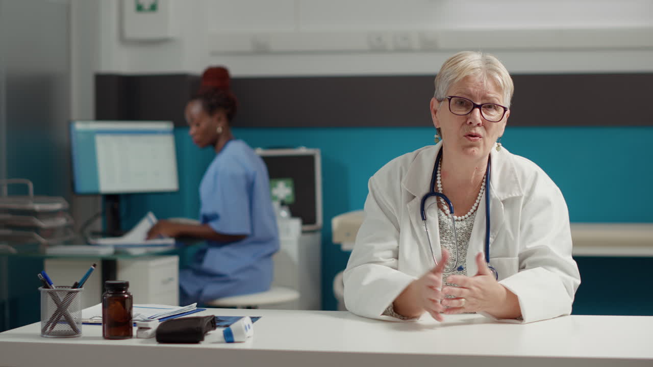 POV of physician talking to patient on online videocall meeting