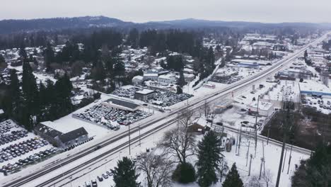 car lots and traffic on highway after ice storm, aerial