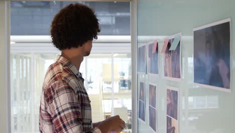 young man working in a creative office