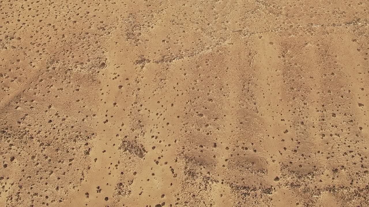 Luftfoto af sandet terræn på Fuerteventura, Spanien