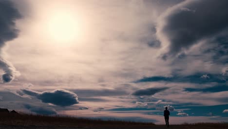 striking black silhouette outline of a male jogger, jogging against a dramatic sky