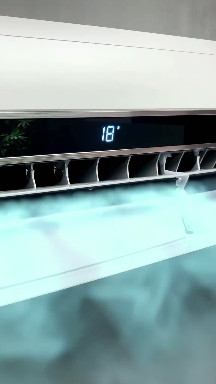 Moderne airconditioner die koele lucht blaast met een 18 graden display