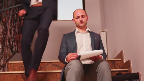 businessman working on stairs in finance corporate