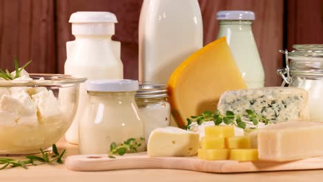 various dairy items displayed on a wooden surface