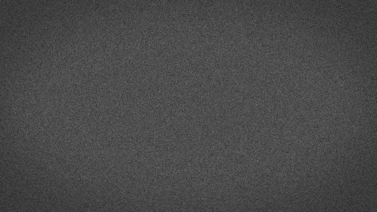 Animation of grey abstract noise specks moving fast on grey background