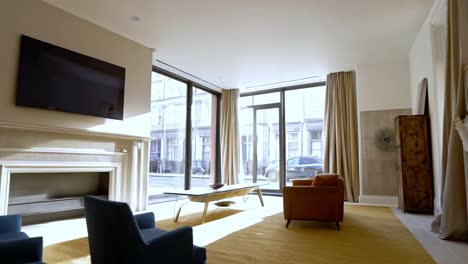 modern living room with fireplace and city view