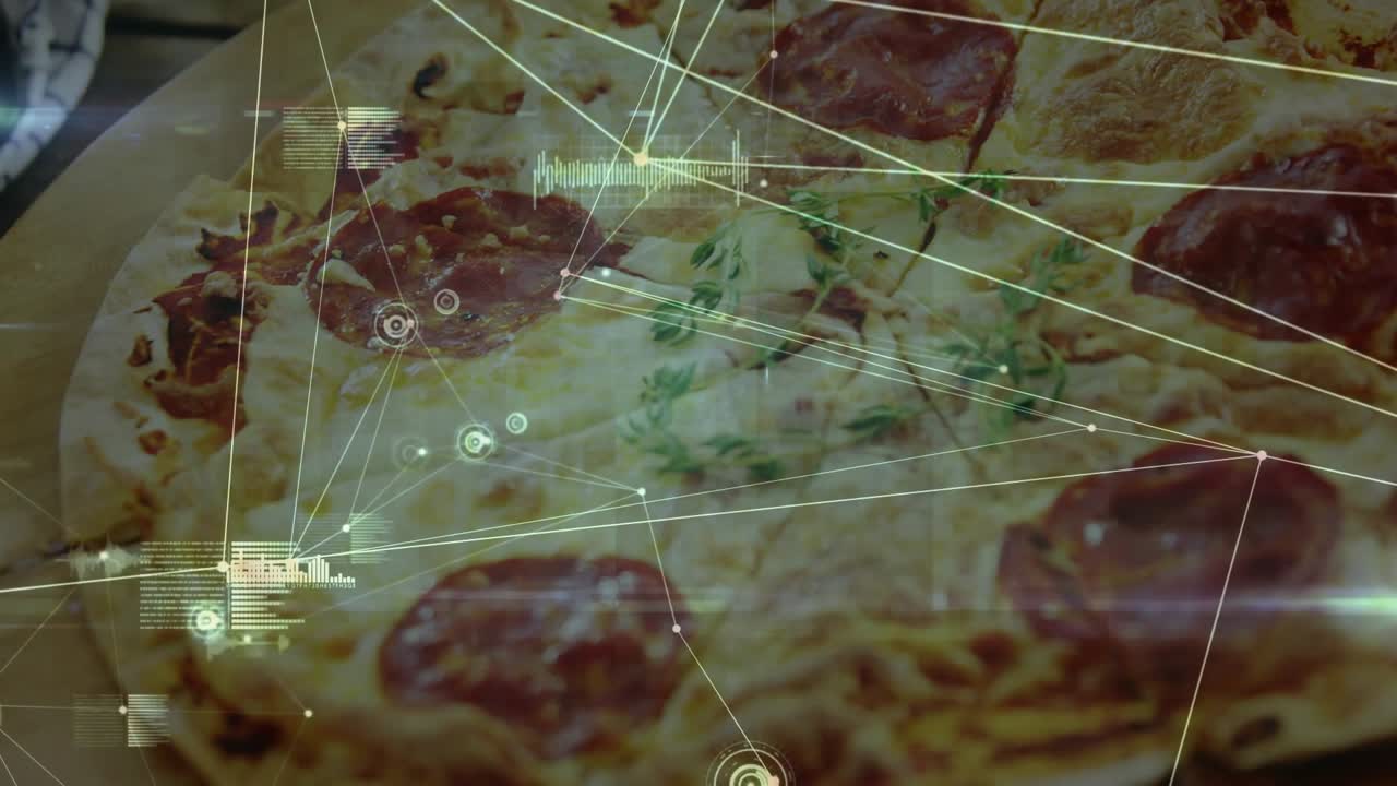 Camera panning down and right, HUD graphics expanding and mapping pizza toppings for analytics