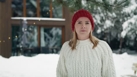 Close-up-of-woman-standing-outdoors-and-enjoying-the-winter.