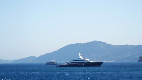 cruise ship sailing on the blue waters of the ionian sea near corfu island