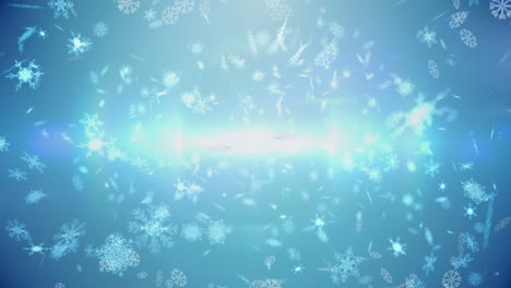 animación de copos de nieve que caen y luz brillante sobre un fondo azul