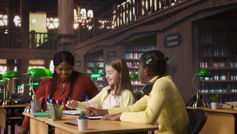 students studying in a library