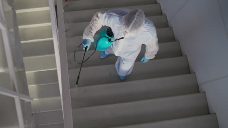 disinfecting building stairwell