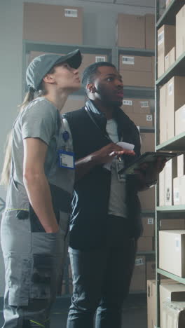 warehouse staff inspecting inventory