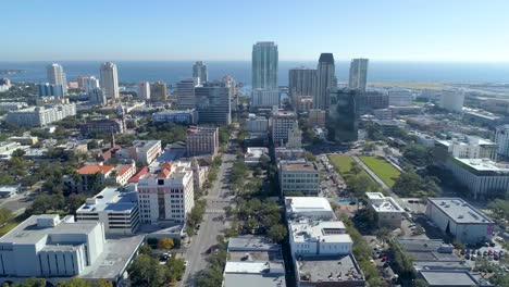 4k aerial video of downtown st petersburg, florida facing east along central avenue from 6th st. to 2nd st.