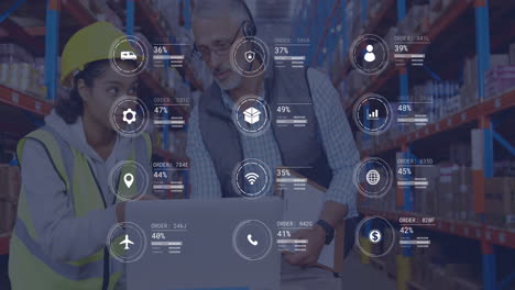Animation-of-data-processing-over-diverse-male-supervisor-and-female-worker-discussing-at-warehouse