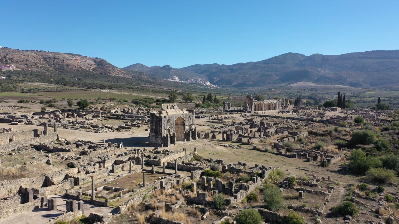 Volubilis is a major archaeological site in Morocco, showcasing Roman-era ruins, vibrant mosaics, temples, and the iconic Arch of Caracalla.