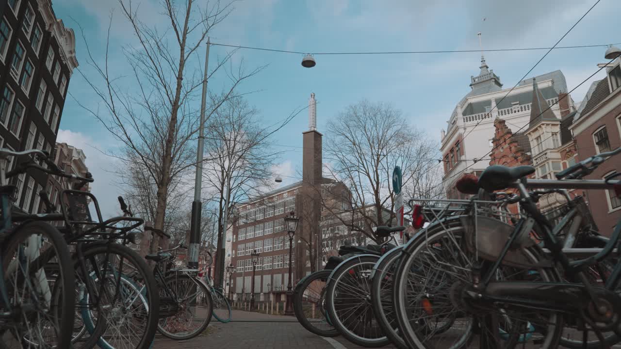 Amsterdam cityscape with bicycles and buildings
