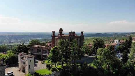 Drone-flies-around-Novello-Castle-during-a-sunny-day-in-Langhe---Summer