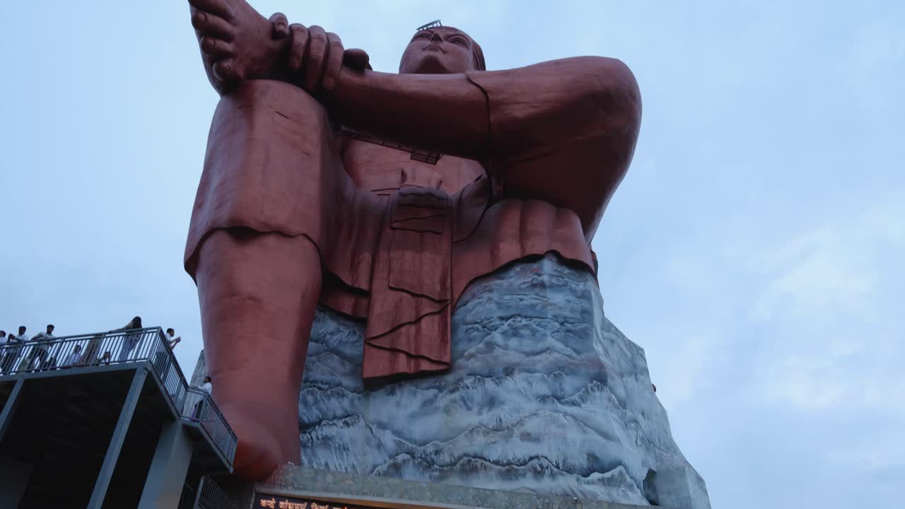 Isolated Statue of holy Hindu Lord Shiva in Meditation Posture with shivlinga at night video is taken at Vishwas Swaroopam or The Statue of Belief at Nathdwara in Rajasthan, India on Aug 11 2024.