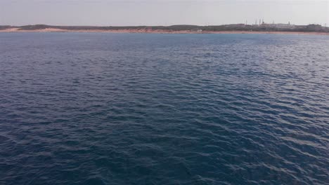 coastal industrial area with calm water