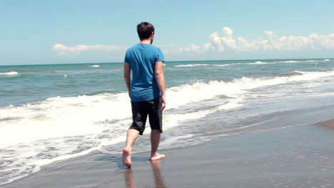 man walking on the beach 1