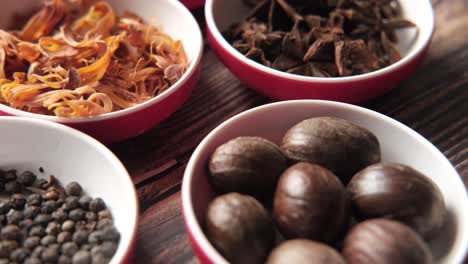 various spices in small bowls