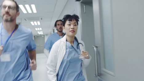 doctors running through a hospital corridor 4k