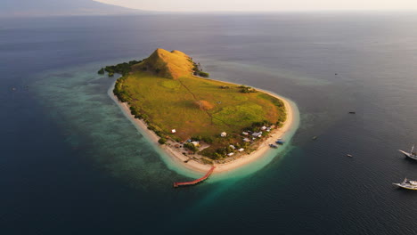 sunset scenery of kenawa island in sumbawa, indonesia - aerial shot