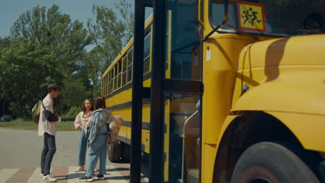 two classmates leaving school bus open door. pupils going out academic shuttle.