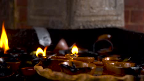 Closeup-Of-Diyas,-Burning-For-Festival-Of-Light