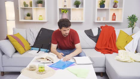 lazy man doesn't want to work from home and looks at empty files.