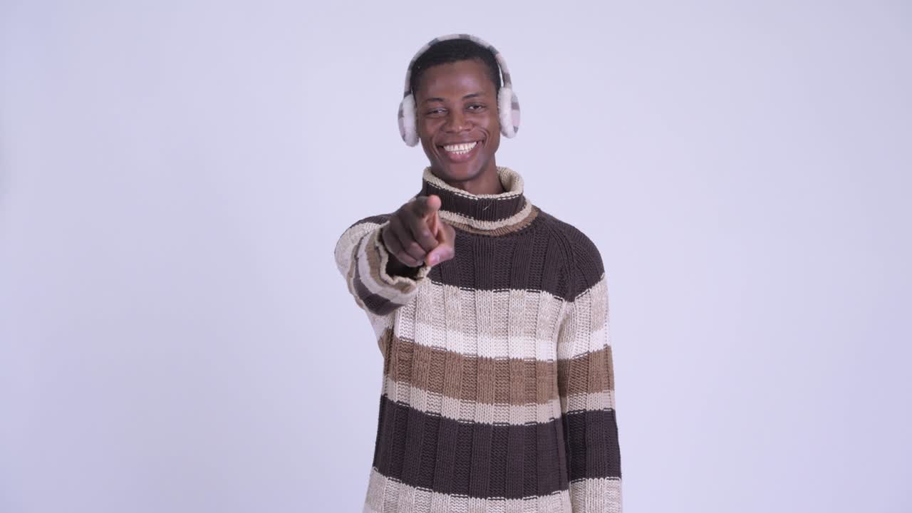 Young handsome African man ready for winter