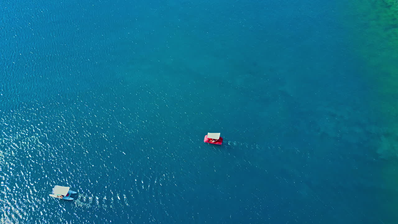 Boat on Lake Kournas Crete Island, Greece sun reflexion nature water, aerial