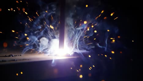 captivating display of sparks and light during a dynamic welding process, showcasing the raw energy and motion as metal is joined together in a stunning finale