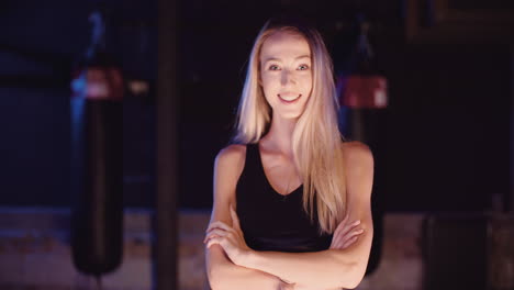 Handheld-Shot-Of-Confident-Young-Woman-Walking-In-Health-Club-2