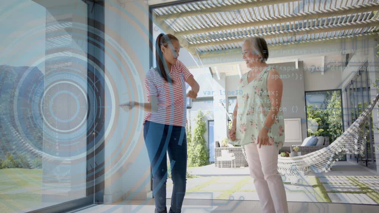 Mother and daughter mimicking smartphone prompts, testing wearable with animated UI in technology