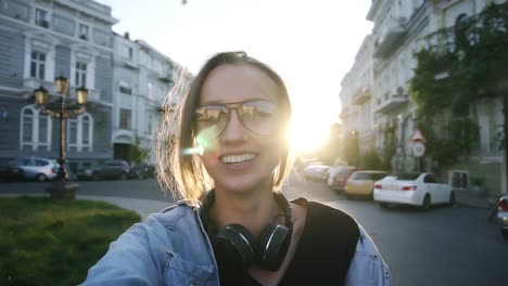 portrait of happy attractive young female posing for camera. smiling, happy lifestyle. cute woman smiling at camera with