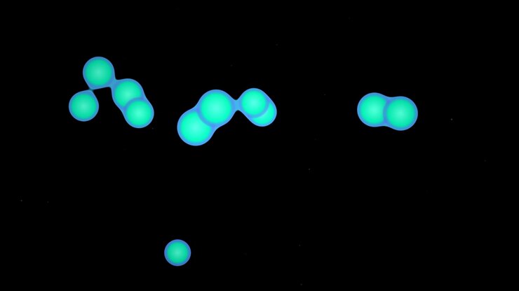 Animazione astratta di sfere ciano luminose che si uniscono e si separano