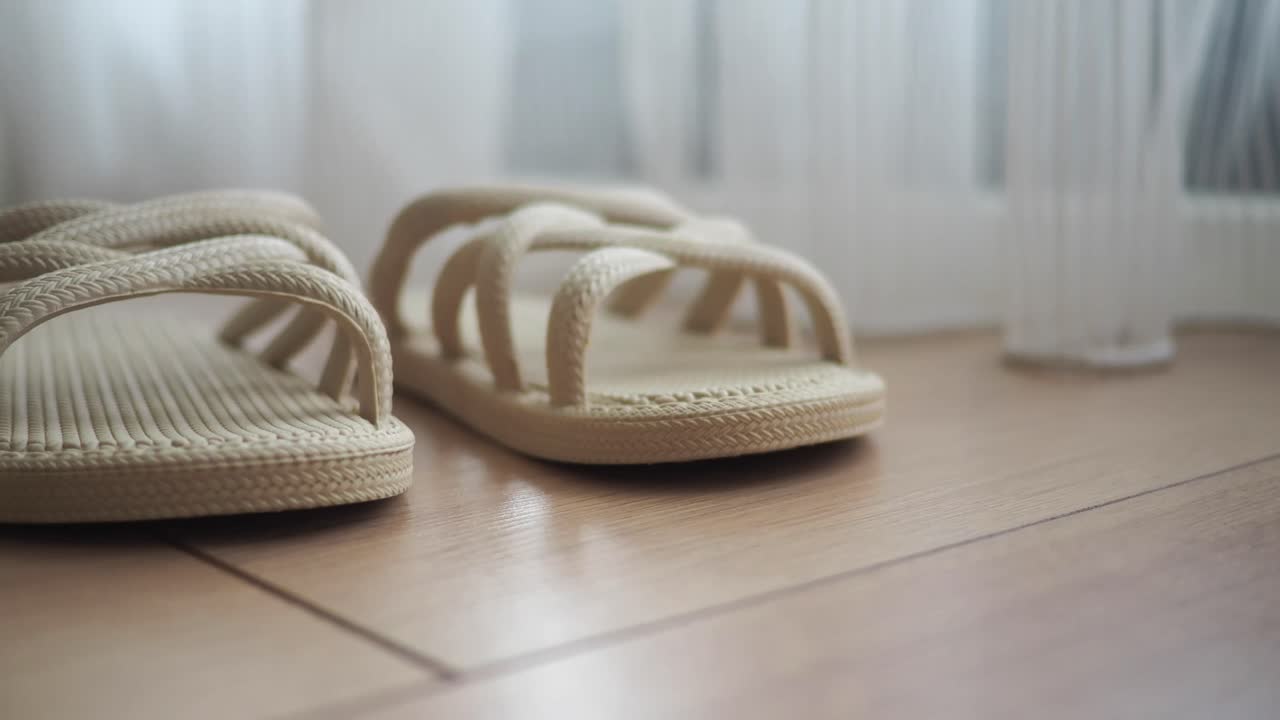 Slippers on a wooden floor